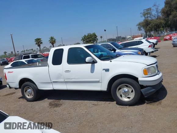 2000 Ford F-150 XL with VIN 1FTRX17L2YNA03263, listed as a IAAI auction lot 42326528 with Not provided miles and . Bid and sale history available at DreamBid. Image 13.