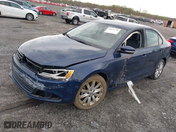 2014 Volkswagen Jetta SE z VIN 3VWD17AJ8EM326015, wystawiony jako IAAI lot #42027359 z przebiegiem 75 436 mil mil oraz . Historia ofert i sprzedaży dostępna na DreamBid. Obrazek 17.