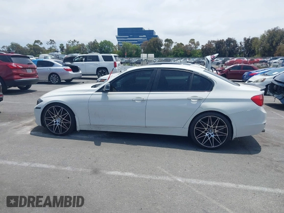 2014 BMW 3 Series 328i with VIN WBA3C1C52EK110753, listed as a IAAI auction lot 42444129 with 169,035 mi miles and . Bid and sale history available at DreamBid. Image 14.