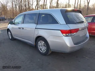2014 Honda Odyssey LX with VIN 5FNRL5H24EB001131, listed as a IAAI auction lot 41753911 with 238,080 mi miles. Bid and sale history available at carsss.com. Image 3.