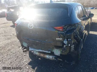 2017 Mazda CX-5 Grand Touring with VIN JM3KFBDL0H0228056, listed as a IAAI auction lot 41611567 with 85,294 mi miles. Bid and sale history available at carsss.com. Image 6.