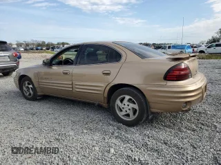 1999 Pontiac Grand Am SE2 with VIN 1G2NE52EXXM716313, listed as a Copart auction lot 86522744 with 102,438 mi miles and Salvage Title. Bid and sale history available at carsss.com. Image 2.