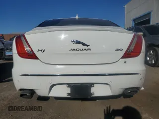 2015 Jaguar XJ z VIN SAJWA1CZ9F8V84689, wystawiony jako Copart lot #86216424 z przebiegiem 72 172 mil mil oraz Czysty tytuł • Clean title. Historia ofert i sprzedaży dostępna na DreamBid. Obrazek 6.