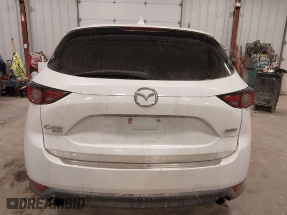 2018 Mazda CX-5 S Premium with VIN JM3KFBDM1J1412088, listed as a IAAI auction lot 41497431 with 65,532 mi miles and . Bid and sale history available at DreamBid. Image 16.