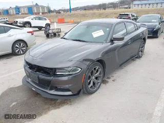 2015 Dodge Charger SXT with VIN 2C3CDXHG2FH825350, listed as a IAAI auction lot 41518230 with 147,232 mi miles. Bid and sale history available at carsss.com. Image 2.