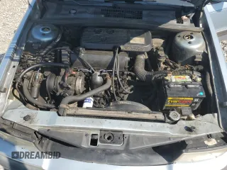 1989 Dodge Spirit z VIN 1B3BA46K1KF408949, wystawiony jako Copart lot #80767594 z przebiegiem 137 766 mil mil oraz Nie do naprawy. Historia ofert i sprzedaży dostępna na DreamBid. Obrazek 11.