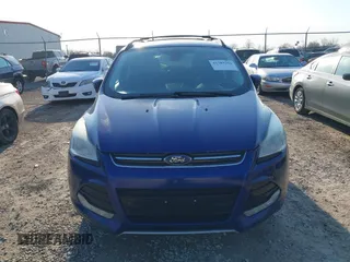 2013 Ford Escape SEL with VIN 1FMCU9HX5DUB24167, listed as a IAAI auction lot 41789266 with 130,608 mi miles. Bid and sale history available at carsss.com. Image 6.