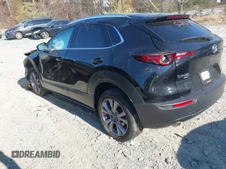 2023 Mazda CX-30 2.5 S Premium Package with VIN 3MVDMBDMXPM529797, listed as a IAAI auction lot 41012225 with 26,354 mi miles. Bid and sale history available at carsss.com. Image 3.