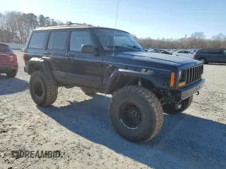 1997 Jeep Cherokee Country with VIN 1J4FJ78S2VL574492, listed as a Copart auction lot 88568685 with 244,465 mi miles and Salvage Title. Bid and sale history available at carsss.com. Image 4.
