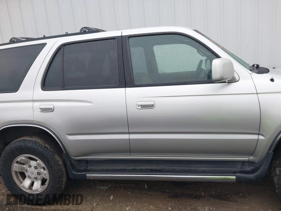 1999 Toyota 4Runner SR5 with VIN JT3HN86RXX0232435, listed as a IAAI auction lot 41473618 with 267,054 mi miles and . Bid and sale history available at DreamBid. Image 14.