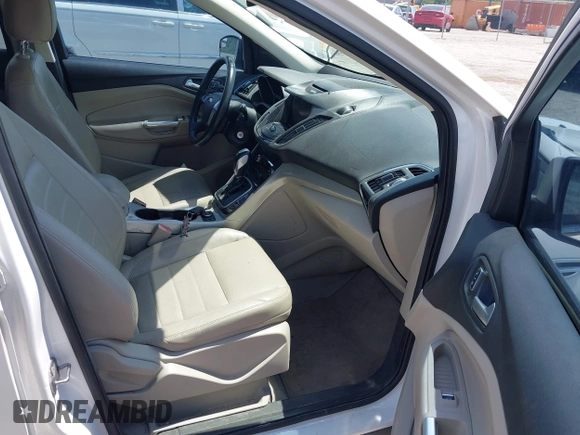 2013 Ford Escape SEL z VIN 1FMCU0H94DUD22476, wystawiony jako IAAI lot #42673808 z przebiegiem 215 811 mil mil oraz . Historia ofert i sprzedaży dostępna na DreamBid. Obrazek 5.