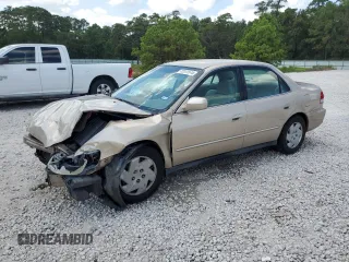 2002 Honda Accord LX z VIN 1HGCG16472A053110, wystawiony jako Copart lot #72372574 z przebiegiem Nie podano mil oraz Szkoda całkowita • Salvage title. Historia ofert i sprzedaży dostępna na DreamBid. Obrazek 1.