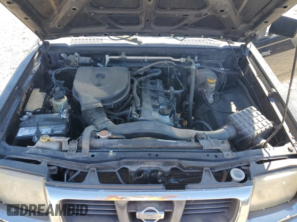 1999 Nissan Frontier XE with VIN 1N6DD26S6XC327079, listed as a Copart auction lot 49295335 with 170,753 mi miles and Salvage title. Bid and sale history available at DreamBid. Image 11.