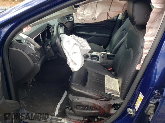 2012 Cadillac SRX Performance Collection with VIN 3GYFNEE36CS655976, listed as a Copart auction lot 47621475 with 144,835 mi miles and Salvage title. Bid and sale history available at DreamBid. Image 7.