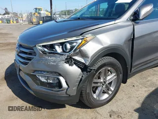 2017 Hyundai Santa Fe 2.4L z VIN 5XYZU3LB4HG446961, wystawiony jako IAAI lot #42214109 z przebiegiem 140 175 mil mil oraz . Historia ofert i sprzedaży dostępna na DreamBid. Obrazek 6.