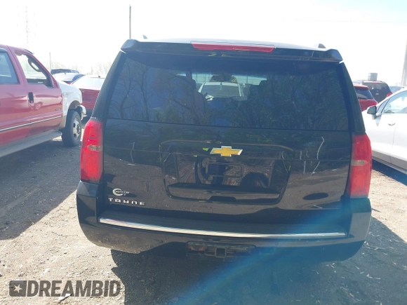 2015 Chevrolet Tahoe LTZ z VIN 1GNSKCKC8FR141163, wystawiony jako IAAI lot #42114008 z przebiegiem 221 804 mil mil oraz . Historia ofert i sprzedaży dostępna na DreamBid. Obrazek 16.