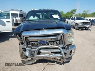 2014 Ford Super Duty F-250 SRW XL with VIN 1FT7W2BT7EEB23580, listed as a IAAI auction lot 42009328 with 102,149 mi miles. Bid and sale history available at carsss.com. Image 13.