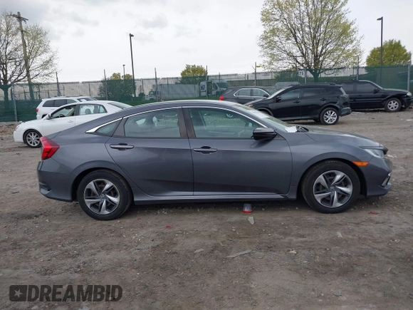 2019 Honda Civic Sedan LX with VIN 2HGFC2F66KH595946, listed as a IAAI auction lot 42017066 with 37,634 mi miles. Bid and sale history available at carsss.com. Image 13.