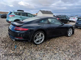 2017 Porsche 911 Carrera with VIN WP0AA2A96HS107967, listed as a Copart auction lot 48043775 with 57,235 mi miles and Salvage Title. Bid and sale history available at carsss.com. Image 3.