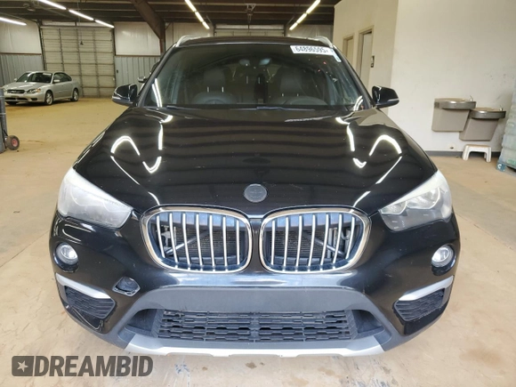 2018 BMW X1 xDrive28i with VIN WBXHT3C32J5F89449, listed as a Copart auction lot 64896595 with 108,804 mi miles and Clean title. Bid and sale history available at DreamBid. Image 5.