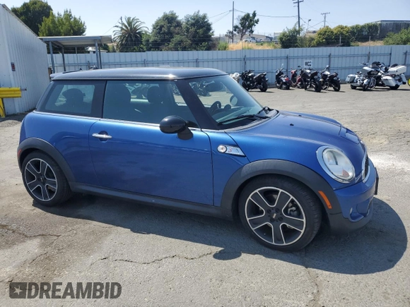 2013 MINI Hardtop S with VIN WMWSV3C53DT391200, listed as a Copart auction lot 59903365 with 48,654 mi miles and Salvage title. Bid and sale history available at DreamBid. Image 4.