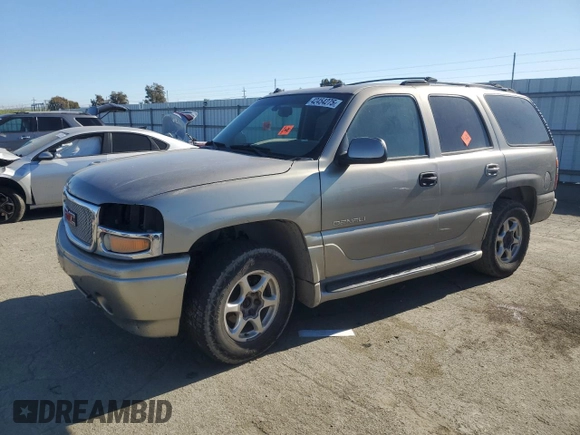 2003 GMC Yukon Denali z VIN 1GKEK63U93J339277, wystawiony jako Copart lot #42454275 z przebiegiem Nie podano mil oraz Szkody całkowita. Historia ofert i sprzedaży dostępna na DreamBid. Obrazek 1.