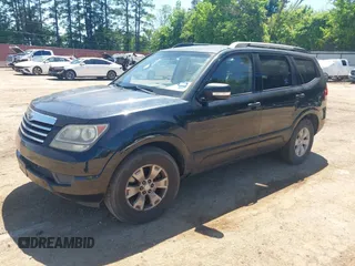 2009 Kia Borrego LX with VIN KNDJJ741395033538, listed as a IAAI auction lot 42088382 with 119,225 mi miles. Bid and sale history available at carsss.com. Image 2.
