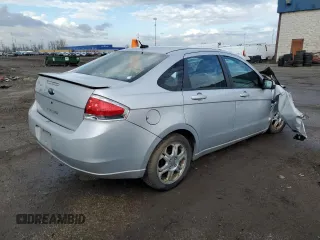 2008 Ford Focus SE with VIN 1FAHP35N18W272107, listed as a Copart auction lot 53861905 with 264,684 mi miles and Salvage Title. Bid and sale history available at DreamBid. Image 3.