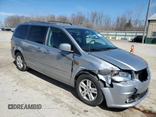 2013 Dodge Grand Caravan Crew with VIN 2C4RDGDG7DR795748, listed as a Copart auction lot 50329195 with 223,956 mi miles and Salvage Title. Bid and sale history available at DreamBid. Image 4.