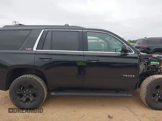 2017 Chevrolet Tahoe LT with VIN 1GNSKBKCXHR388181, listed as a IAAI auction lot 41936609 with 94,783 mi miles and . Bid and sale history available at DreamBid. Image 14.