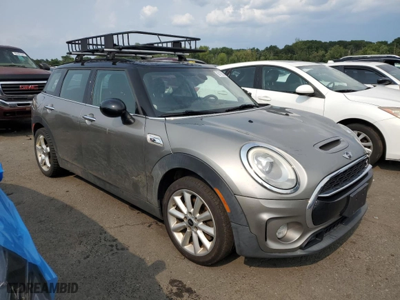 2017 MINI Clubman Cooper S with VIN WMWLU5C55H2F24329, listed as a Copart auction lot 67163314 with 129,818 mi miles and Salvage Title. Bid and sale history available at carsss.com. Image 4.