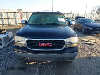 2002 GMC Yukon SLT with VIN 1GKEC13Z42J245768, listed as a IAAI auction lot 41769081 with 389,189 mi miles. Bid and sale history available at carsss.com. Image 12.