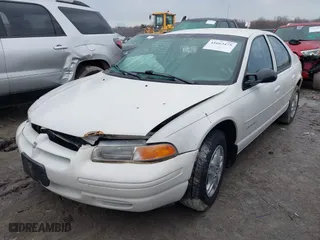 1999 Dodge Stratus with VIN 1B3EJ46X6XN614967, listed as a IAAI auction lot 41663475 with 130,245 mi miles. Bid and sale history available at carsss.com. Image 2.
