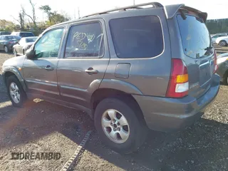 2003 Mazda Tribute LX with VIN 4F2CZ94133KM52401, listed as a IAAI auction lot 42142297 with Not Provided miles and . Bid and sale history available at carsss.com. Image 3.