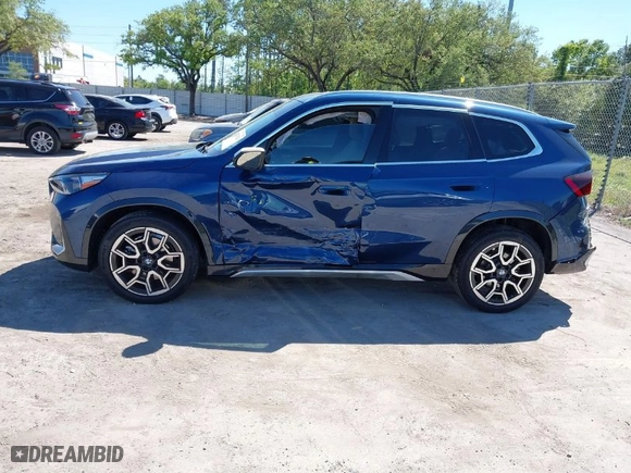 2024 BMW X1 xDrive28i with VIN WBX73EF08R5Z79084, listed as a IAAI auction lot 41823125 with 4,702 mi miles. Bid and sale history available at carsss.com. Image 14.