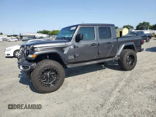 2022 Jeep Gladiator High Altitude с VIN 1C6HJTFG2NL114665, выставлен на аукционе Copart как лот 59818015 с пробегом 29 246 миль миль и Списание • Salvage title. История ставок и продаж доступна на DreamBid. Изображение 1.