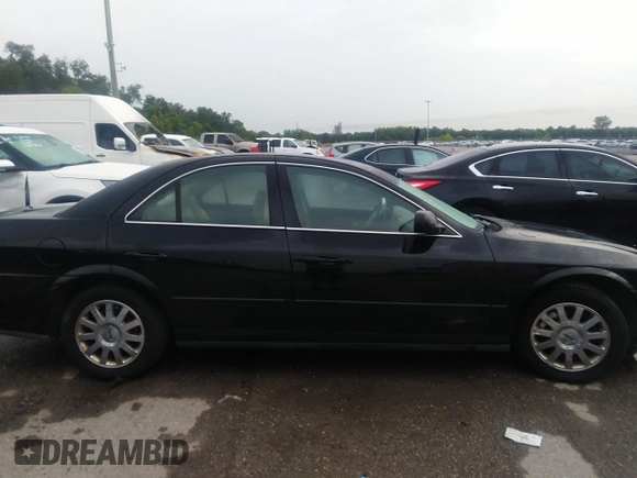 2005 Lincoln LS w/Luxury Pkg with VIN 1LNHM86S85Y606813, listed as a IAAI auction lot 39938974 with 131,558 mi miles. Bid and sale history available at carsss.com. Image 13.