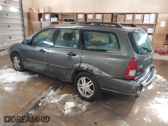 2005 Ford Focus SE with VIN 1FAFP36N45W158796, listed as a IAAI auction lot 41823987 with 145,803 mi miles and . Bid and sale history available at carsss.com. Image 3.