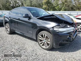 2016 BMW X6 xDrive50i with VIN 5UXKU6C50G0R33915, listed as a Copart auction lot 42183104 with 121,075 mi miles. Bid and sale history available at carsss.com. Image 4.
