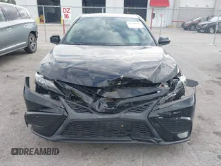 2021 Toyota Camry SE Nightshade with VIN 4T1G11AK2MU471174, listed as a IAAI auction lot 41740546 with 77,037 mi miles. Bid and sale history available at carsss.com. Image 12.