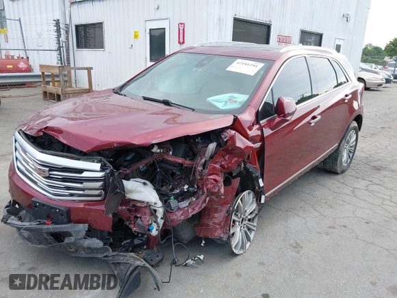 2017 Cadillac XT5 Luxury FWD z VIN 1GYKNBRS1HZ200882, wystawiony jako IAAI lot #42181291 z przebiegiem 95 687 mil mil oraz . Historia ofert i sprzedaży dostępna na DreamBid. Obrazek 2.