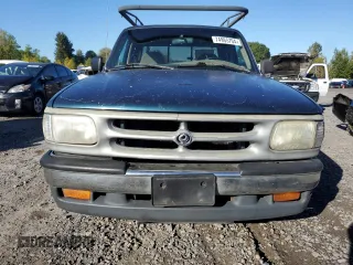 1997 Mazda B-Series 2WD Truck LE with VIN 4F4CR16X3VTM12603, listed as a Copart auction lot 74965704 with 145,098 mi miles and Salvage Title. Bid and sale history available at carsss.com. Image 5.
