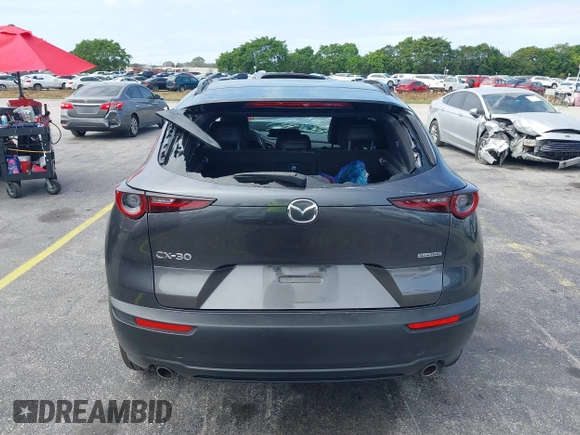 2021 Mazda CX-30 Preferred with VIN 3MVDMACLXMM228431, listed as a IAAI auction lot 41575602 with 67,854 mi miles. Bid and sale history available at carsss.com. Image 16.