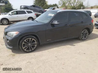 2015 BMW X1 xDrive28i with VIN WBAVL1C53FVY37408, listed as a Copart auction lot 53092995 with 105,195 mi miles and Salvage Title. Bid and sale history available at carsss.com. Image 1.