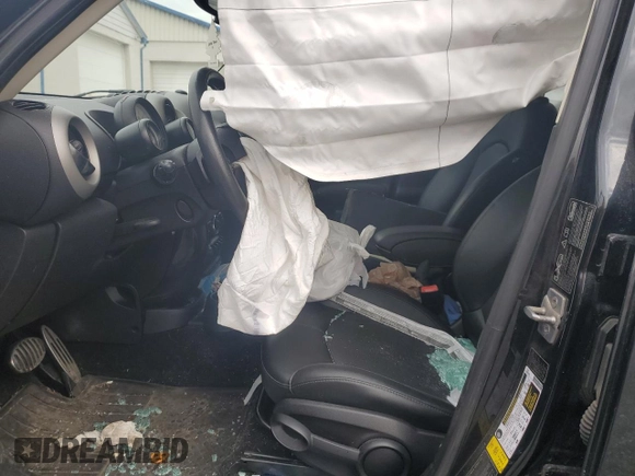 2012 MINI Countryman S with VIN WMWZC5C52CWL56578, listed as a Copart auction lot 51097735 with Not Provided miles and Salvage Title. Bid and sale history available at DreamBid. Image 7.