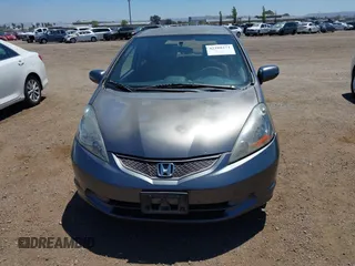 2013 Honda Fit z VIN JHMGE8H34DC082914, wystawiony jako IAAI lot #42288271 z przebiegiem 186 269 mil mil oraz . Historia ofert i sprzedaży dostępna na DreamBid. Obrazek 12.