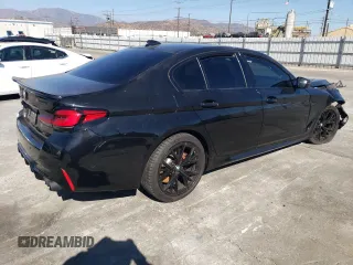 2023 BMW 5 Series M550i xDrive with VIN WBA13BK03PCM44838, listed as a Copart auction lot 68434874 with 17,798 mi miles and Salvage title. Bid and sale history available at DreamBid. Image 3.