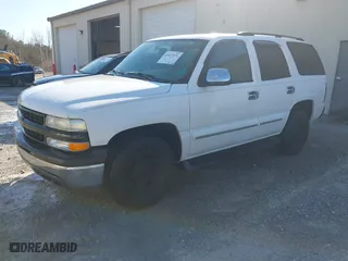 2004 Chevrolet Tahoe LT with VIN 1GNEC13Z54R112847, listed as a IAAI auction lot 41633571 with 234,991 mi miles. Bid and sale history available at carsss.com. Image 2.
