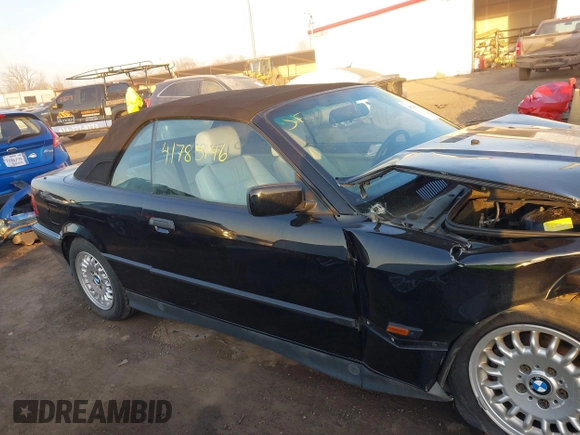 1995 BMW 3 Series 325iC with VIN WBABJ6328SJD38619, listed as a IAAI auction lot 41785146 with 93,742 mi miles. Bid and sale history available at carsss.com. Image 14.