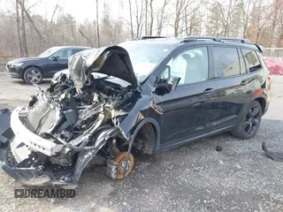 2019 Honda Passport Elite with VIN 5FNYF8H00KB010472, listed as a IAAI auction lot 42013475 with 62,577 mi miles. Bid and sale history available at carsss.com. Image 2.